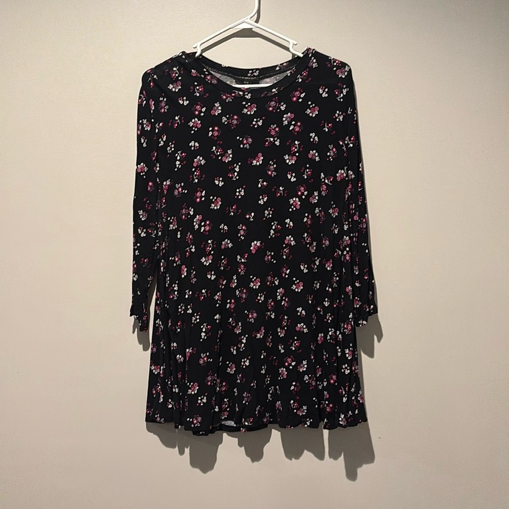 Black with pink, purple, and white floral design tunic